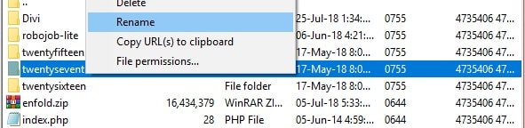 Rename your current WordPress theme folder with FileZilla
