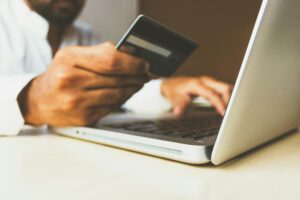 Picture of a user entering their credit card.
